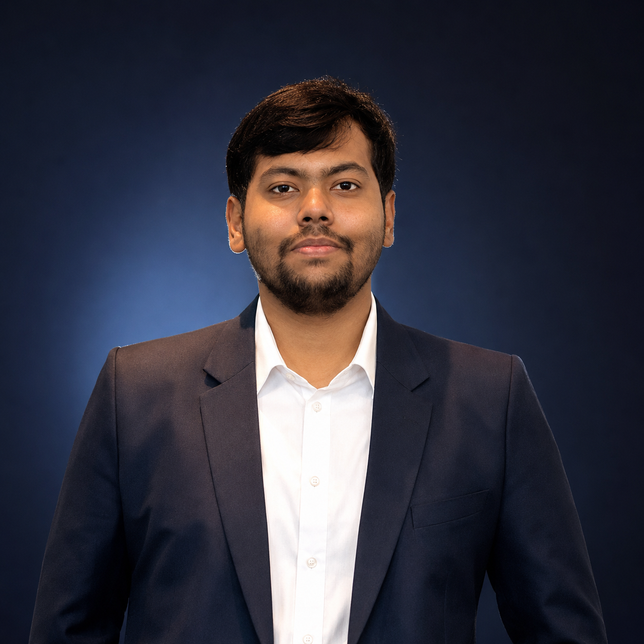 Sakir Ahmed at a SWIFT international conference, standing in front of SWIFT branding